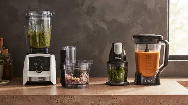 Editorial illustration for Blender or Food Processor First? The Tool Decision That Shapes Your Plant-Based Kitchen